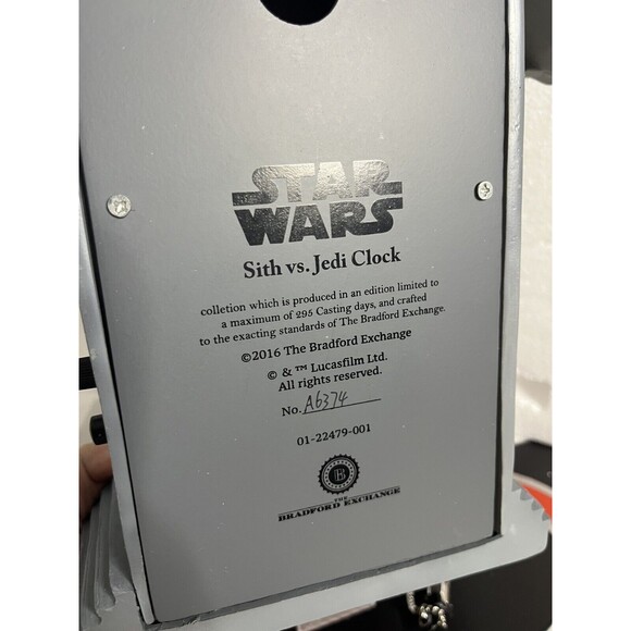 STAR WARS Sith Vs. Jedi Wall Clock With Light-Up Lightsabers - Picture 9 of 14